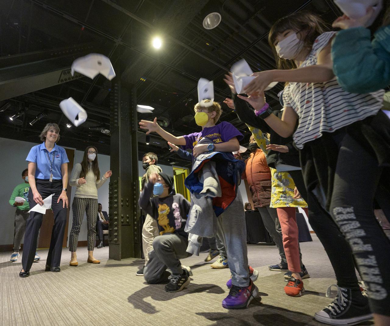 Cindy Hasselbring, NASA K-12 Education Advisor at NASA’s Office of STEM Engagement, teaches students about aeronautics and testing during a presentation, Thursday, April 28, 2022, at the National Museum of African American History and Culture in Washington. Photo Credit: (NASA/Bill Ingalls)