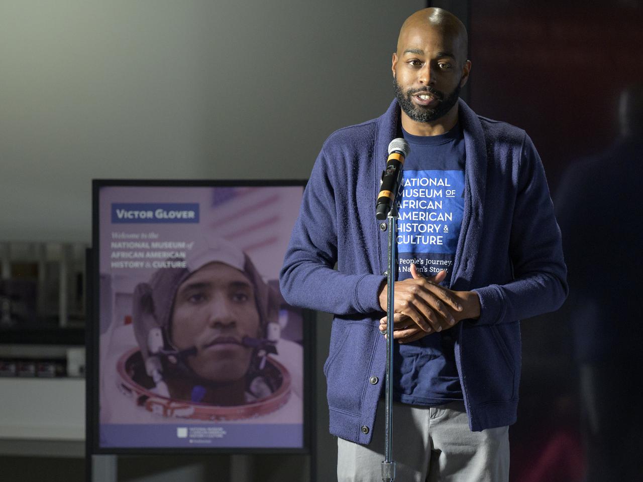 Christopher Williams, STEM Education Specialist for the National Museum of African American History and Culture introduces NASA astronaut Victor Glover during an education event, Thursday, April 28, 2022, at the National Museum of African American History and Culture in Washington. Glover most recently served as pilot and second-in-command on the Crew-1 SpaceX Crew Dragon, named Resilience, which landed after a long duration mission aboard the International Space Station, May 2, 2021. Photo Credit: (NASA/Bill Ingalls)