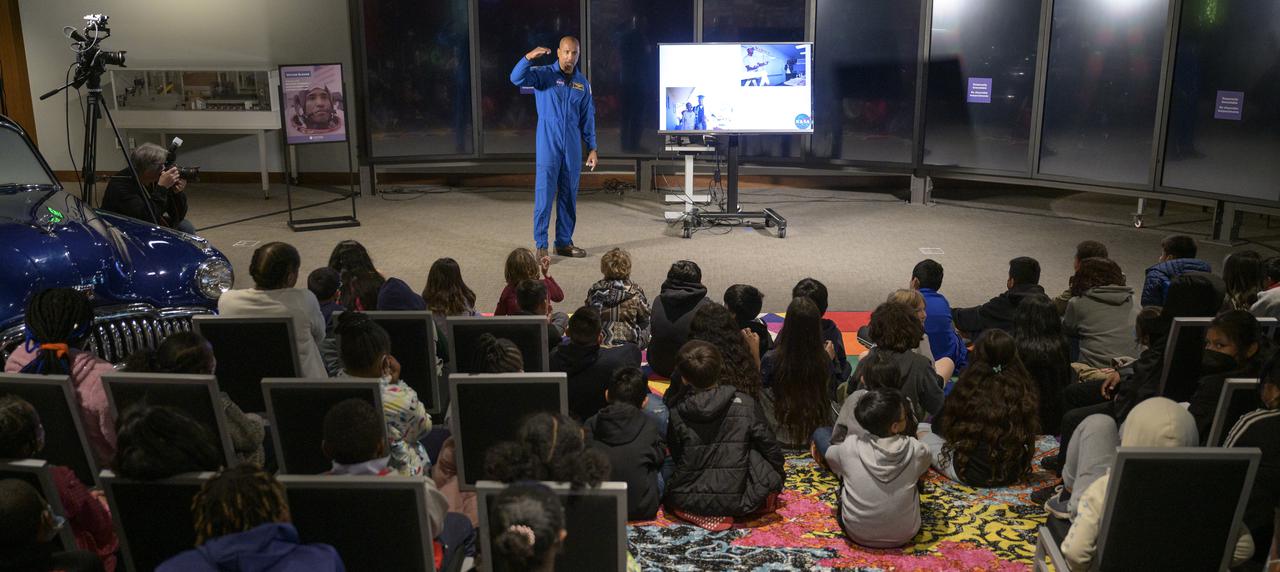 NASA astronaut Victor Glover talks with school students in person and via live stream during an educational event, Thursday, April 28, 2022, at the National Museum of African American History and Culture in Washington. Glover most recently served as pilot and second-in-command on the Crew-1 SpaceX Crew Dragon, named Resilience, which landed after a long duration mission aboard the International Space Station, May 2, 2021. Photo Credit: (NASA/Bill Ingalls)