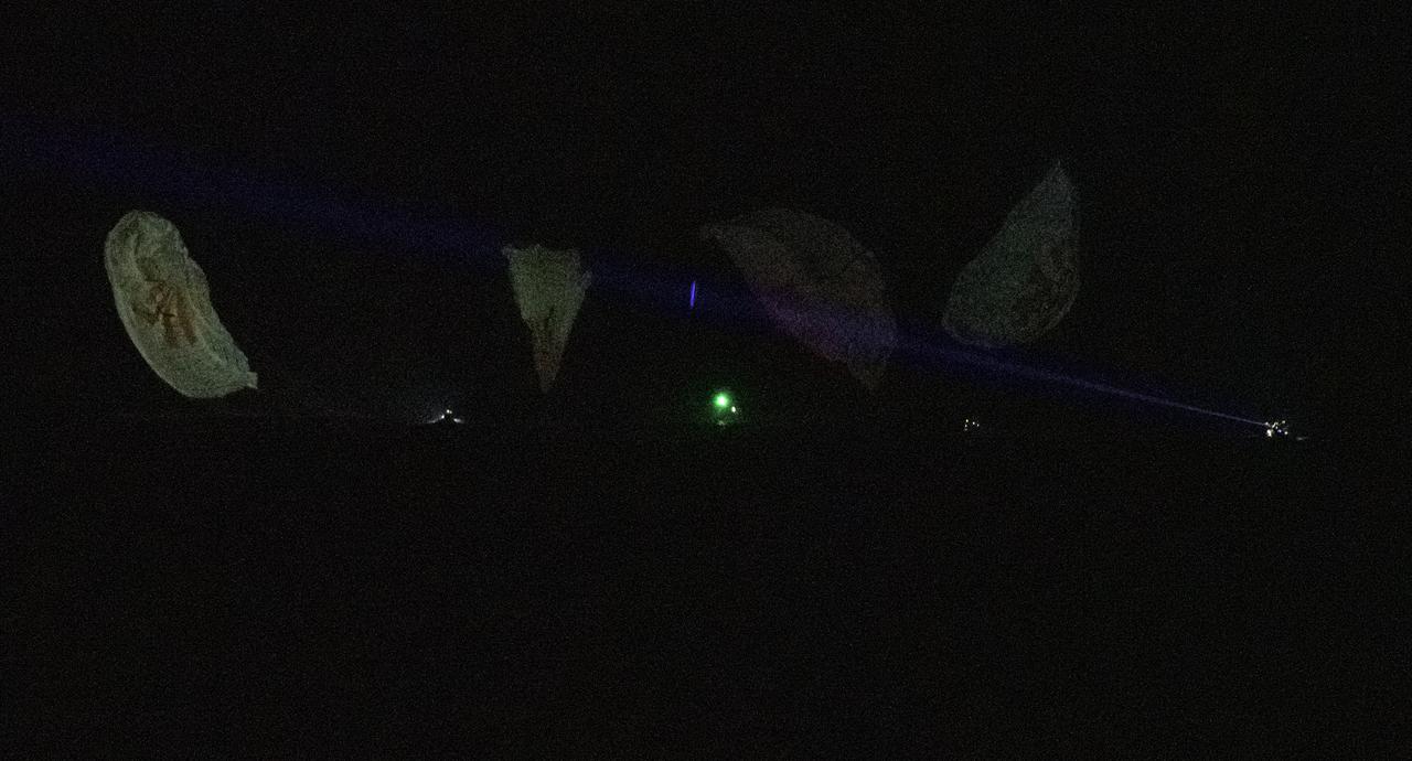 The SpaceX Crew Dragon Endurance spacecraft is seen as it lands with NASA astronauts Raja Chari, Kayla Barron, Tom Marshburn, and ESA (European Space Agency) astronaut Matthias Maurer aboard, in the Gulf of Mexico, off the coast of Tampa, Florida, Friday, May 6, 2022. Maurer, Marshburn, Chari, and Barron are returning after 177 days in space as part of Expeditions 66 and 67 aboard the International Space Station. Photo Credit: (NASA/Aubrey Gemignani)