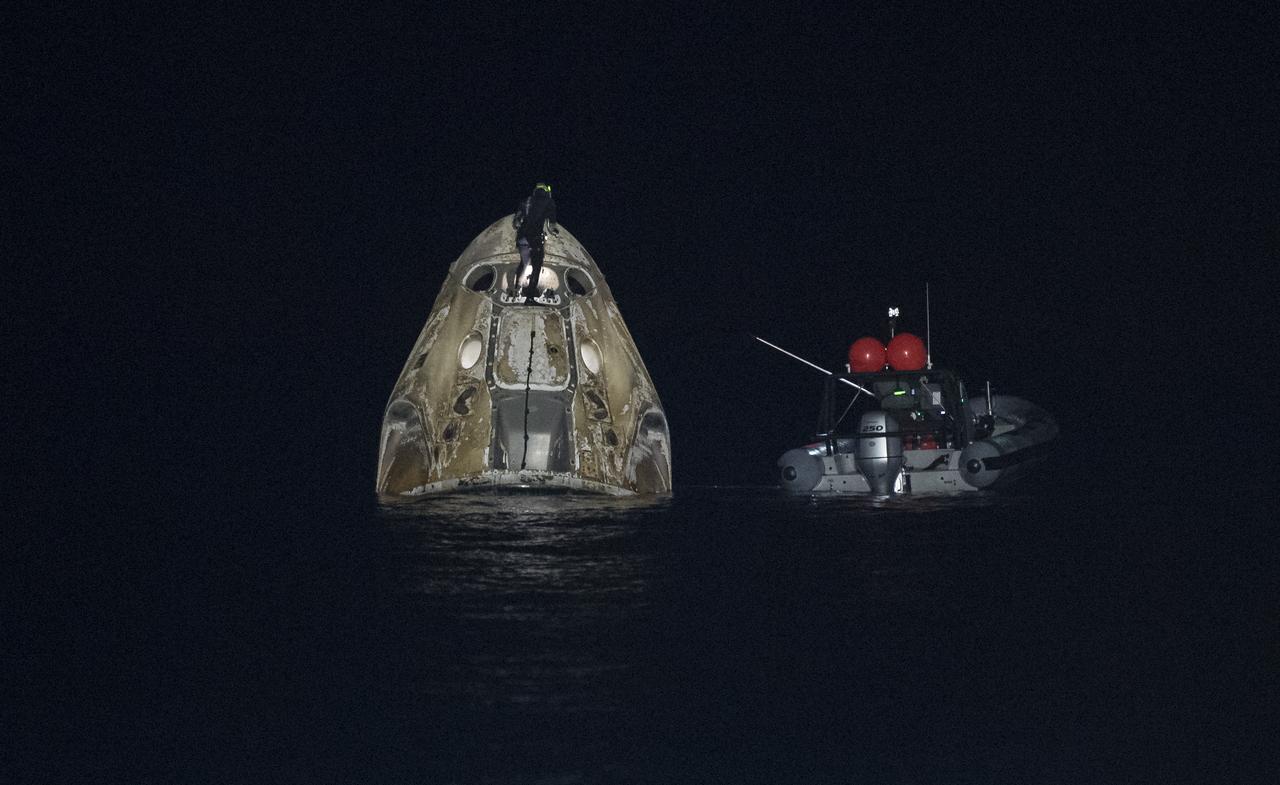 Support teams work around the SpaceX Crew Dragon Endurance spacecraft shortly after it landed with NASA astronauts Raja Chari, Kayla Barron, Tom Marshburn, and ESA (European Space Agency) astronaut Matthias Maurer aboard, in the Gulf of Mexico, off the coast of Tampa, Florida, Friday, May 6, 2022. Maurer, Marshburn, Chari, and Barron are returning after 177 days in space as part of Expeditions 66 and 67 aboard the International Space Station. Photo Credit: (NASA/Aubrey Gemignani)