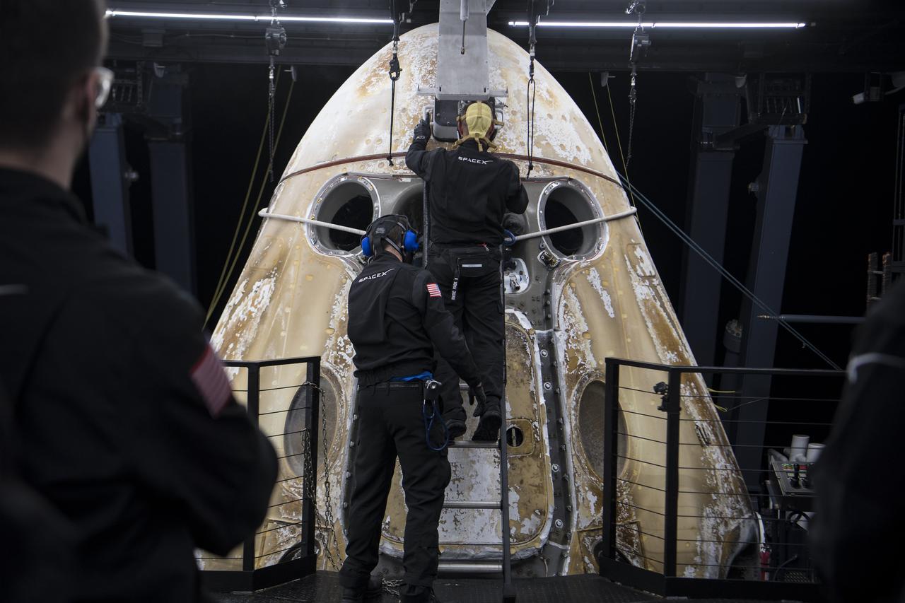 Support teams work around the SpaceX Crew Dragon Endurance spacecraft shortly after it landed with NASA astronauts Raja Chari, Kayla Barron, Tom Marshburn, and ESA (European Space Agency) astronaut Matthias Maurer aboard, in the Gulf of Mexico, off the coast of Tampa, Florida, Friday, May 6, 2022. Maurer, Marshburn, Chari, and Barron are returning after 177 days in space as part of Expeditions 66 and 67 aboard the International Space Station. Photo Credit: (NASA/Aubrey Gemignani)