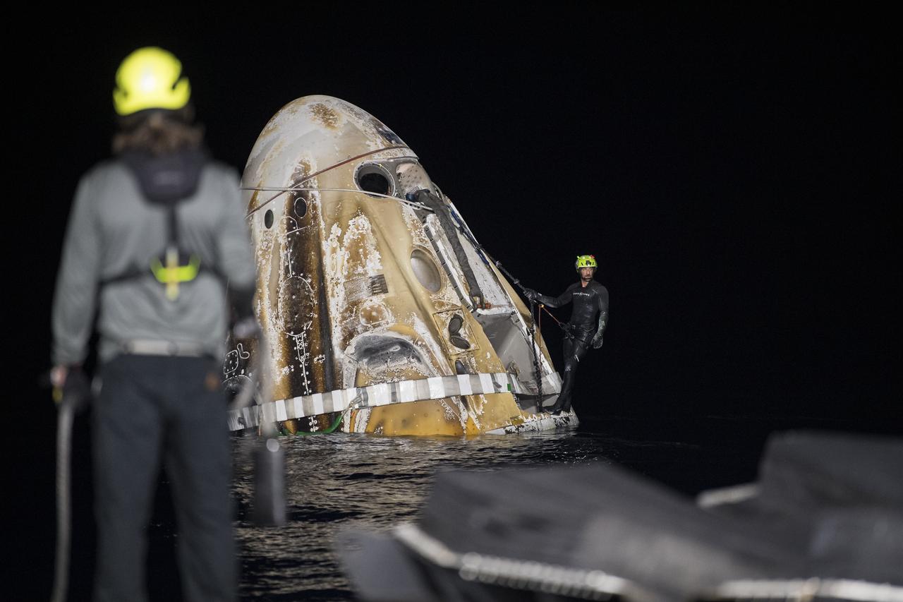 Support teams work around the SpaceX Crew Dragon Endurance spacecraft shortly after it landed with NASA astronauts Raja Chari, Kayla Barron, Tom Marshburn, and ESA (European Space Agency) astronaut Matthias Maurer aboard, in the Gulf of Mexico, off the coast of Tampa, Florida, Friday, May 6, 2022. Maurer, Marshburn, Chari, and Barron are returning after 177 days in space as part of Expeditions 66 and 67 aboard the International Space Station. Photo Credit: (NASA/Aubrey Gemignani)