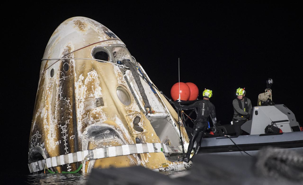 Support teams work around the SpaceX Crew Dragon Endurance spacecraft shortly after it landed with NASA astronauts Raja Chari, Kayla Barron, Tom Marshburn, and ESA (European Space Agency) astronaut Matthias Maurer aboard, in the Gulf of Mexico, off the coast of Tampa, Florida, Friday, May 6, 2022. Maurer, Marshburn, Chari, and Barron are returning after 177 days in space as part of Expeditions 66 and 67 aboard the International Space Station. Photo Credit: (NASA/Aubrey Gemignani)