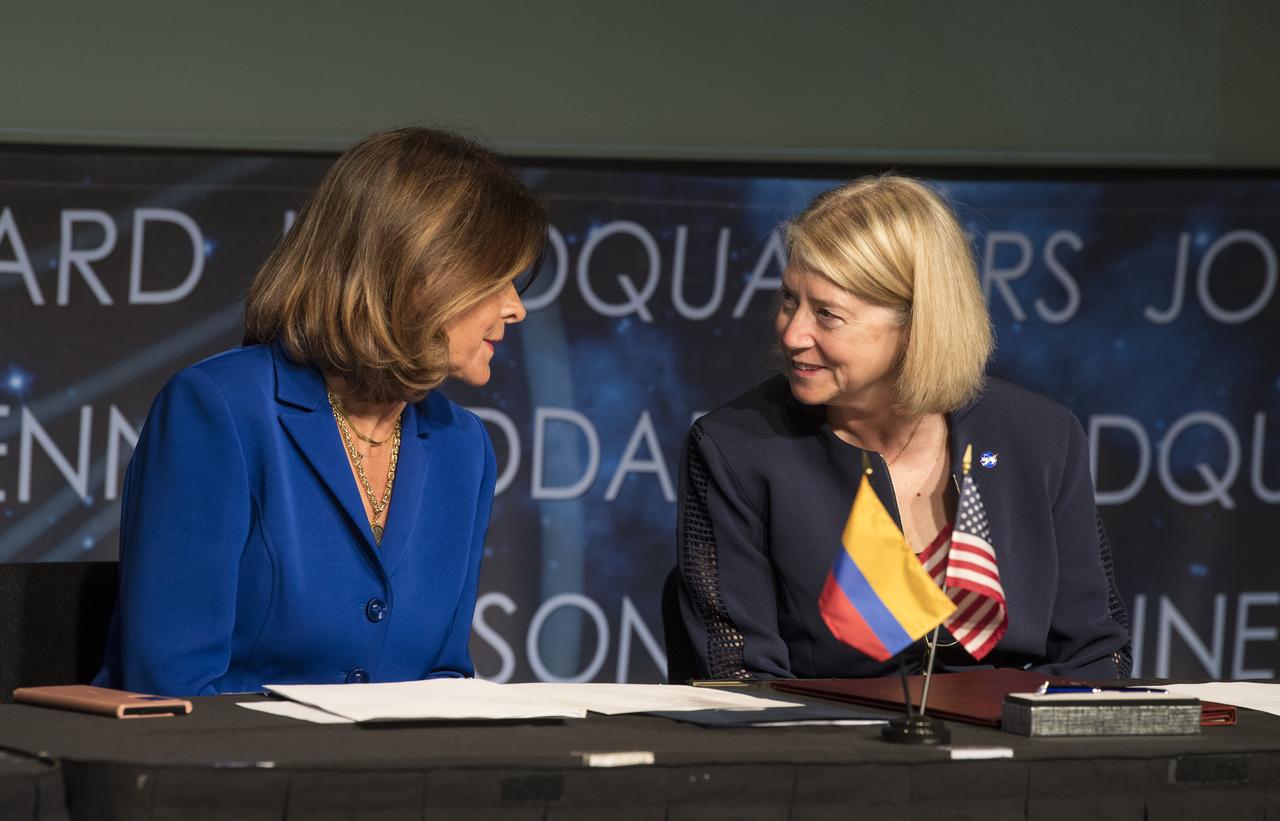 Colombian Vice President and Foreign Minister, Marta Lucía Ramírez, left, and NASA Deputy Administrator Pam Melroy speak before Vice President Ramírez signs the Artemis Accords, Tuesday, May 10, 2022, at NASA Headquarters in Washington DC. Colombia is the nineteenth country to sign the Artemis Accords, which establish a practical set of principles to guide space exploration cooperation among nations participating in NASA’s Artemis program. Photo Credit: (NASA/Aubrey Gemignani)