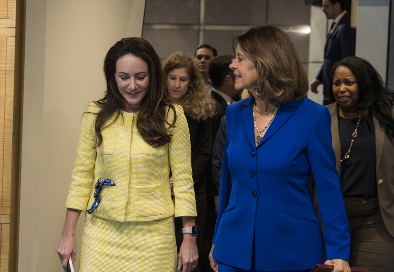 NASA Chief of Staff, Susie Perez Quinn, left, speaks with Colombian Vice President and Foreign Minister, Marta Lucía Ramírez, right, after she signed the Artemis Accords, Tuesday, May 10, 2022, at NASA Headquarters in Washington DC. Colombia is the nineteenth country to sign the Artemis Accords, which establish a practical set of principles to guide space exploration cooperation among nations participating in NASA’s Artemis program. Photo Credit: (NASA/Aubrey Gemignani)