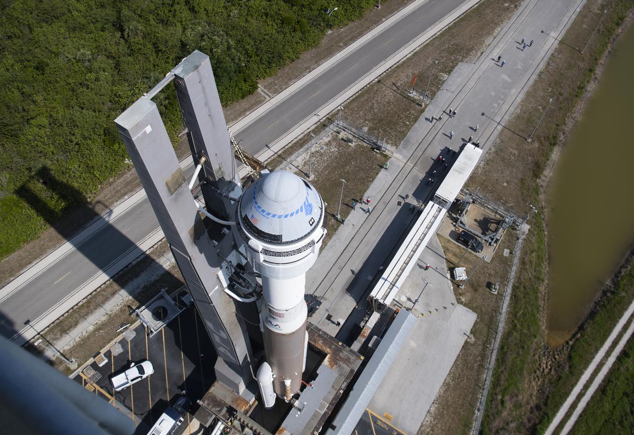 A United Launch Alliance Atlas V rocket with Boeing’s CST-100 Starliner spacecraft aboard is seen as it is rolled out of the Vertical Integration Facility to the launch pad at Space Launch Complex 41 ahead of the Orbital Flight Test-2 (OFT-2) mission, Wednesday, May 18, 2022 at Cape Canaveral Space Force Station in Florida. Boeing’s Orbital Flight Test-2 will be Starliner’s second uncrewed flight test and will dock to the International Space Station as part of NASA's Commercial Crew Program. The mission, currently targeted for launch at 6:54 p.m. ET on May 19, will serve as an end-to-end test of the system's capabilities. Photo Credit: (NASA/Joel Kowsky)