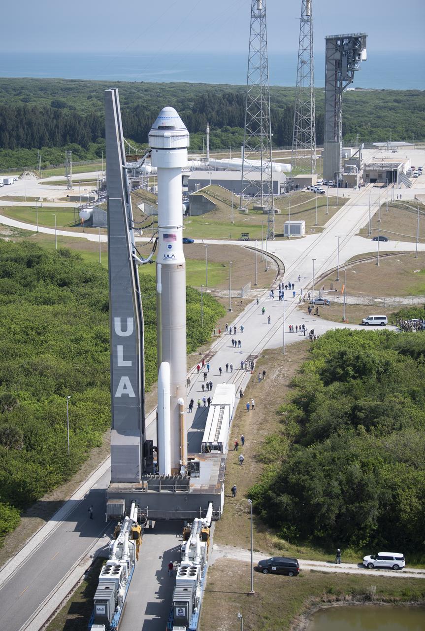 A United Launch Alliance Atlas V rocket with Boeing’s CST-100 Starliner spacecraft aboard is seen as it is rolled out of the Vertical Integration Facility to the launch pad at Space Launch Complex 41 ahead of the Orbital Flight Test-2 (OFT-2) mission, Wednesday, May 18, 2022 at Cape Canaveral Space Force Station in Florida. Boeing’s Orbital Flight Test-2 will be Starliner’s second uncrewed flight test and will dock to the International Space Station as part of NASA's Commercial Crew Program. The mission, currently targeted for launch at 6:54 p.m. ET on May 19, will serve as an end-to-end test of the system's capabilities. Photo Credit: (NASA/Joel Kowsky)