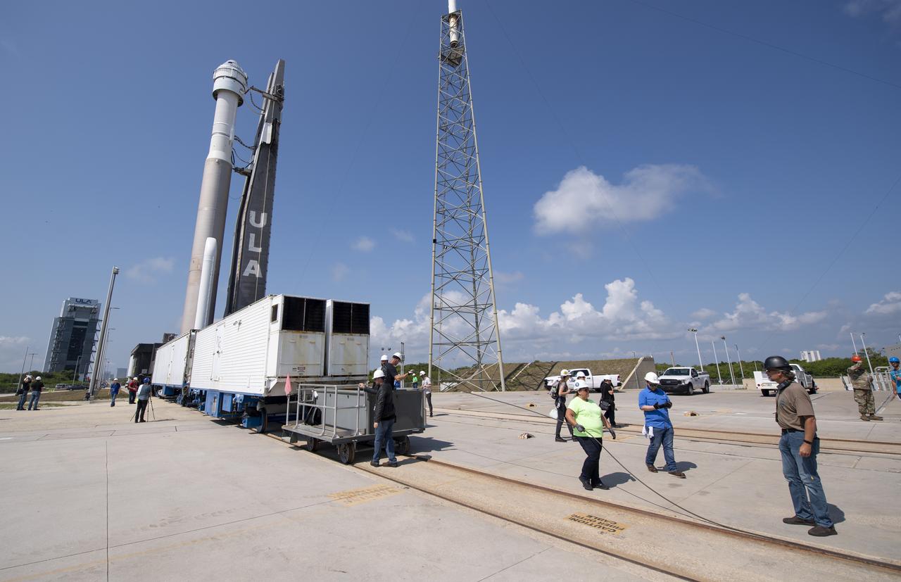 A United Launch Alliance Atlas V rocket with Boeing’s CST-100 Starliner spacecraft aboard is seen as it is rolled out of the Vertical Integration Facility to the launch pad at Space Launch Complex 41 ahead of the Orbital Flight Test-2 (OFT-2) mission, Wednesday, May 18, 2022 at Cape Canaveral Space Force Station in Florida. Boeing’s Orbital Flight Test-2 will be Starliner’s second uncrewed flight test and will dock to the International Space Station as part of NASA's Commercial Crew Program. The mission, currently targeted for launch at 6:54 p.m. ET on May 19, will serve as an end-to-end test of the system's capabilities. Photo Credit: (NASA/Joel Kowsky)