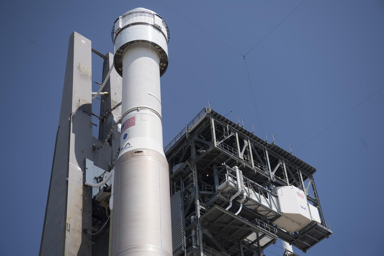 A United Launch Alliance Atlas V rocket with Boeing’s CST-100 Starliner spacecraft aboard is seen after being rolled out of the Vertical Integration Facility to the launch pad at Space Launch Complex 41 ahead of the Orbital Flight Test-2 (OFT-2) mission, Wednesday, May 18, 2022 at Cape Canaveral Space Force Station in Florida. Boeing’s Orbital Flight Test-2 will be Starliner’s second uncrewed flight test and will dock to the International Space Station as part of NASA's Commercial Crew Program. The mission, currently targeted for launch at 6:54 p.m. ET on May 19, will serve as an end-to-end test of the system's capabilities. Photo Credit: (NASA/Joel Kowsky)