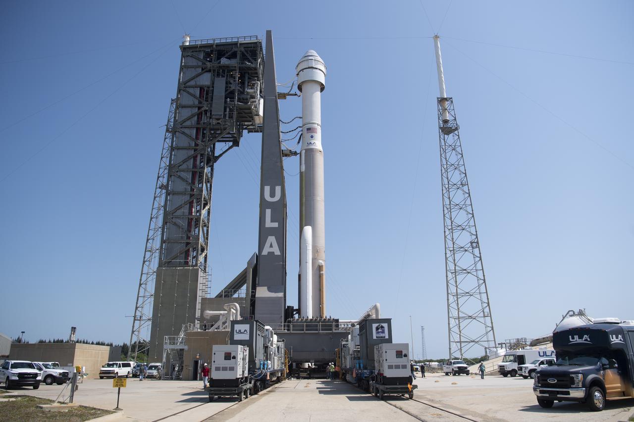 A United Launch Alliance Atlas V rocket with Boeing’s CST-100 Starliner spacecraft aboard is seen after being rolled out of the Vertical Integration Facility to the launch pad at Space Launch Complex 41 ahead of the Orbital Flight Test-2 (OFT-2) mission, Wednesday, May 18, 2022 at Cape Canaveral Space Force Station in Florida. Boeing’s Orbital Flight Test-2 will be Starliner’s second uncrewed flight test and will dock to the International Space Station as part of NASA's Commercial Crew Program. The mission, currently targeted for launch at 6:54 p.m. ET on May 19, will serve as an end-to-end test of the system's capabilities. Photo Credit: (NASA/Joel Kowsky)