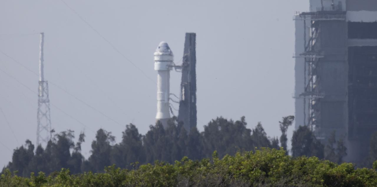 A United Launch Alliance Atlas V rocket with Boeing’s CST-100 Starliner spacecraft aboard is seen as it is rolled out of the Vertical Integration Facility to the launch pad at Space Launch Complex 41 ahead of the Orbital Flight Test-2 (OFT-2) mission, Wednesday, May 18, 2022 at Cape Canaveral Space Force Station in Florida. Boeing’s Orbital Flight Test-2 will be Starliner’s second uncrewed flight test and will dock to the International Space Station as part of NASA's Commercial Crew Program. The mission, currently targeted for launch at 6:54 p.m. ET on May 19, will serve as an end-to-end test of the system's capabilities. Photo Credit: (NASA/Joel Kowsky)