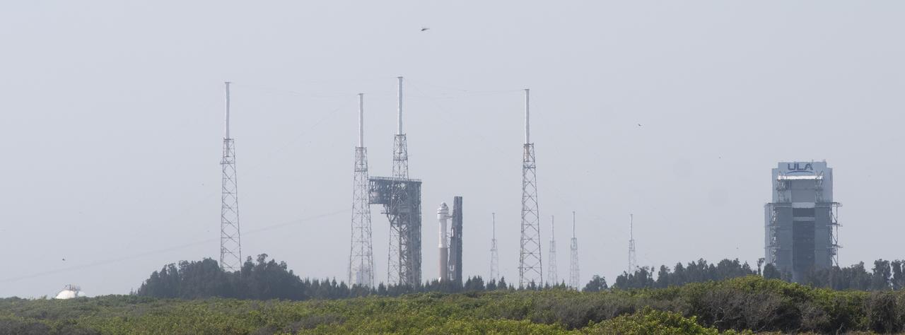 A United Launch Alliance Atlas V rocket with Boeing’s CST-100 Starliner spacecraft aboard is seen as it is rolled out of the Vertical Integration Facility to the launch pad at Space Launch Complex 41 ahead of the Orbital Flight Test-2 (OFT-2) mission, Wednesday, May 18, 2022 at Cape Canaveral Space Force Station in Florida. Boeing’s Orbital Flight Test-2 will be Starliner’s second uncrewed flight test and will dock to the International Space Station as part of NASA's Commercial Crew Program. The mission, currently targeted for launch at 6:54 p.m. ET on May 19, will serve as an end-to-end test of the system's capabilities. Photo Credit: (NASA/Joel Kowsky)