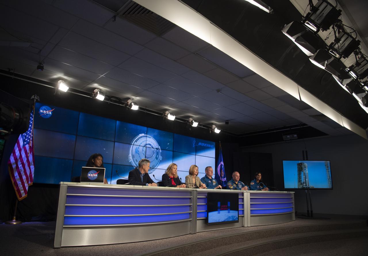 Jasmine Hopkins, NASA Communications, left, Bob Cabana, NASA associate administrator, second from left, Kennedy Space Center director Janet Petro, third from left, Kathy Lueders, associate administrator for NASA's Space Operations Mission Directorate, center, and NASA astronauts Barry "Butch" Wilmore, third from right, Mike Fincke, second from right, and Suni Williams, right, are seen during a press conference ahead of the launch of Boeing’s Starliner spacecraft aboard a United Launch Alliance Atlas V rocket, Wednesday, May 18, 2022, at NASA’s Kennedy Space Center in Florida. Boeing’s Orbital Flight Test-2 will be Starliner’s second uncrewed flight test and will dock to the International Space Station as part of NASA's Commercial Crew Program. The mission, currently targeted for launch on 6:54 p.m. ET on May 19, will serve as an end-to-end test of the system's capabilities. Photo Credit: (NASA/Joel Kowsky)