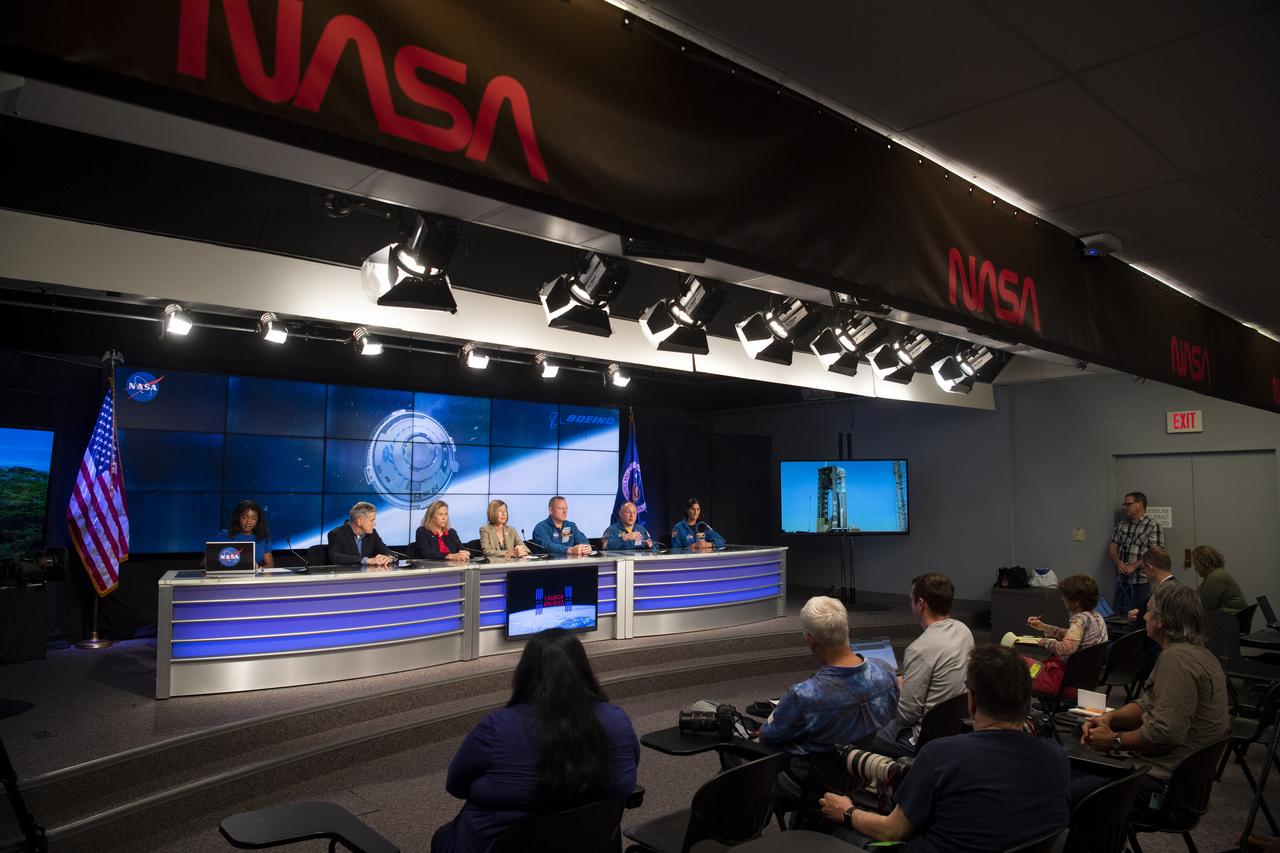 Jasmine Hopkins, NASA Communications, left, Bob Cabana, NASA associate administrator, second from left, Kennedy Space Center director Janet Petro, third from left, Kathy Lueders, associate administrator for NASA's Space Operations Mission Directorate, center, and NASA astronauts Barry "Butch" Wilmore, third from right, Mike Fincke, second from right, and Suni Williams, right, are seen during a press conference ahead of the launch of Boeing’s Starliner spacecraft aboard a United Launch Alliance Atlas V rocket, Wednesday, May 18, 2022, at NASA’s Kennedy Space Center in Florida. Boeing’s Orbital Flight Test-2 will be Starliner’s second uncrewed flight test and will dock to the International Space Station as part of NASA's Commercial Crew Program. The mission, currently targeted for launch on 6:54 p.m. ET on May 19, will serve as an end-to-end test of the system's capabilities. Photo Credit: (NASA/Joel Kowsky)