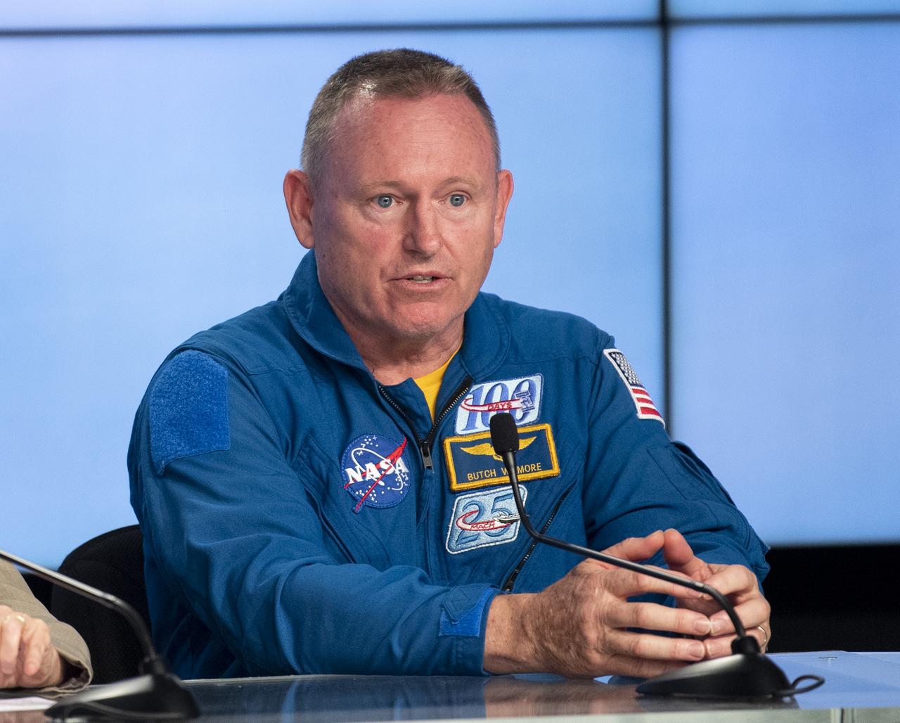NASA astronaut Barry “Butch" Wilmore is seen during a press conference ahead of the launch of Boeing’s Starliner spacecraft aboard a United Launch Alliance Atlas V rocket, Wednesday, May 18, 2022, at NASA’s Kennedy Space Center in Florida. Boeing’s Orbital Flight Test-2 will be Starliner’s second uncrewed flight test and will dock to the International Space Station as part of NASA's Commercial Crew Program. The mission, currently targeted for launch on 6:54 p.m. ET on May 19, will serve as an end-to-end test of the system's capabilities. Photo Credit: (NASA/Joel Kowsky)