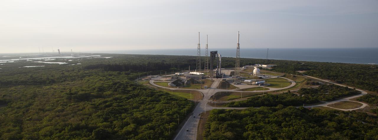 A United Launch Alliance Atlas V rocket with Boeing’s CST-100 Starliner spacecraft aboard is seen on the launch pad at Space Launch Complex 41 ahead of the Orbital Flight Test-2 mission, Wednesday, May 18, 2022 at Cape Canaveral Space Force Station in Florida. Boeing’s Orbital Flight Test-2 will be Starliner’s second uncrewed flight test and will dock to the International Space Station as part of NASA's Commercial Crew Program. The mission, currently targeted for launch on 6:54 p.m. ET on May 19, will serve as an end-to-end test of the system's capabilities. Photo Credit: (NASA/Joel Kowsky)