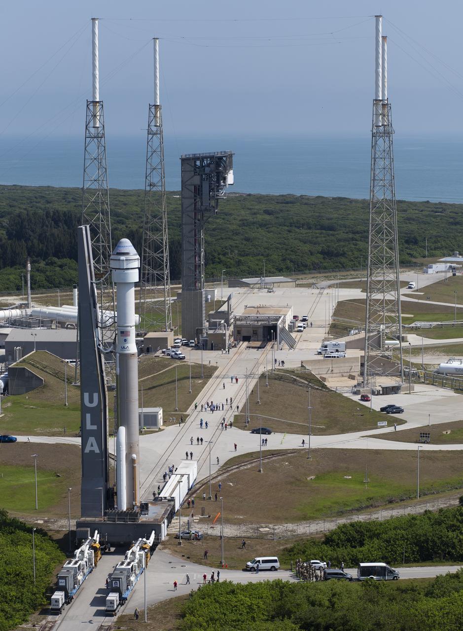 A United Launch Alliance Atlas V rocket with Boeing’s CST-100 Starliner spacecraft aboard is seen as it is rolled out of the Vertical Integration Facility to the launch pad at Space Launch Complex 41 ahead of the Orbital Flight Test-2 (OFT-2) mission, Wednesday, May 18, 2022 at Cape Canaveral Space Force Station in Florida. Boeing’s Orbital Flight Test-2 will be Starliner’s second uncrewed flight test and will dock to the International Space Station as part of NASA's Commercial Crew Program. The mission, currently targeted for launch at 6:54 p.m. ET on May 19, will serve as an end-to-end test of the system's capabilities. Photo Credit: (NASA/Joel Kowsky)