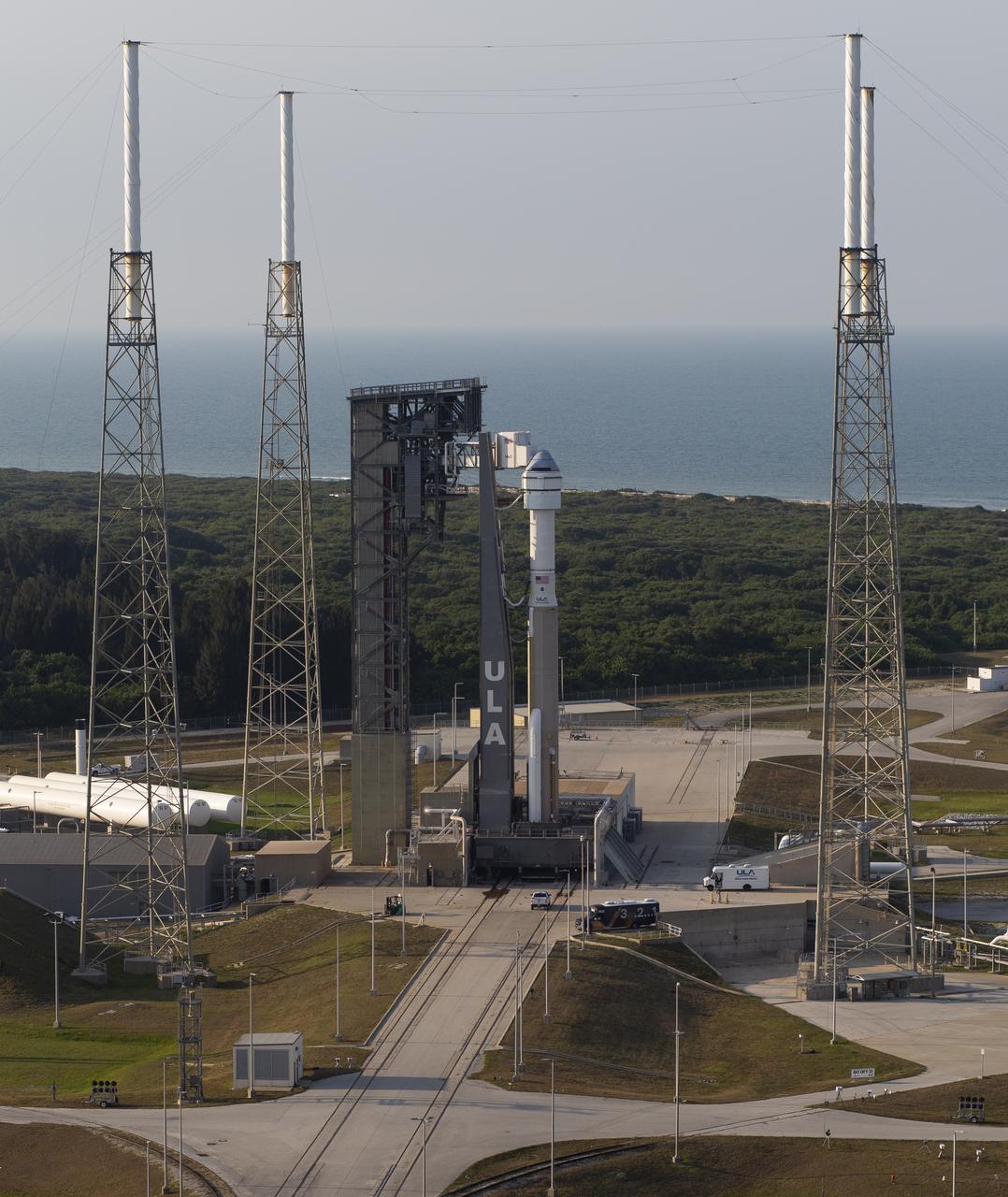 A United Launch Alliance Atlas V rocket with Boeing’s CST-100 Starliner spacecraft aboard is seen on the launch pad at Space Launch Complex 41 ahead of the Orbital Flight Test-2 mission, Wednesday, May 18, 2022 at Cape Canaveral Space Force Station in Florida. Boeing’s Orbital Flight Test-2 will be Starliner’s second uncrewed flight test and will dock to the International Space Station as part of NASA's Commercial Crew Program. The mission, currently targeted for launch on 6:54 p.m. ET on May 19, will serve as an end-to-end test of the system's capabilities. Photo Credit: (NASA/Joel Kowsky)