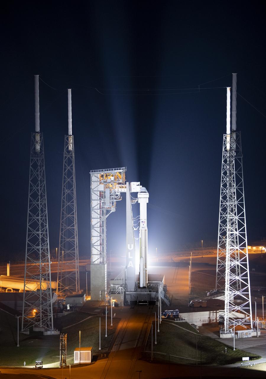 A United Launch Alliance Atlas V rocket with Boeing’s CST-100 Starliner spacecraft aboard is seen illuminated by spotlights on the launch pad at Space Launch Complex 41 ahead of the Orbital Flight Test-2 mission, Wednesday, May 18, 2022 at Cape Canaveral Space Force Station in Florida. Boeing’s Orbital Flight Test-2 will be Starliner’s second uncrewed flight test and will dock to the International Space Station as part of NASA's Commercial Crew Program. The mission, currently targeted for launch on 6:54 p.m. ET on May 19, will serve as an end-to-end test of the system's capabilities. Photo Credit: (NASA/Joel Kowsky)