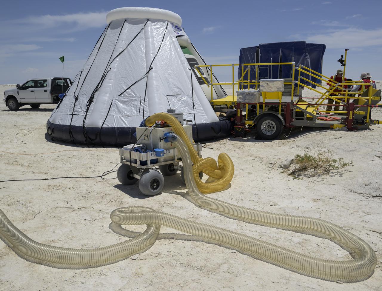 Boeing and NASA teams participate in a mission dress rehearsal to prepare for the landing of the Boeing CST-100 Starliner spacecraft in White Sands, New Mexico, Monday, May 23, 2022. Boeing’s Orbital Flight Test-2 (OFT-2) is Starliner’s second uncrewed flight test to the International Space Station as part of NASA's Commercial Crew Program. OFT-2 serves as an end-to-end test of the system's capabilities. Photo Credit: (NASA/Bill Ingalls)