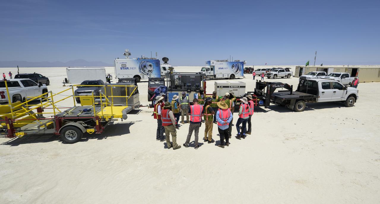 NASA and Boeing teams prepare for the landing of Boeing’s CST-100 Starliner spacecraft at White Sands Missile Range’s Space Harbor, Wednesday, May 25, 2022, in New Mexico. Boeing’s Orbital Flight Test-2 (OFT-2) is Starliner’s second uncrewed flight test to the International Space Station as part of NASA's Commercial Crew Program. OFT-2 serves as an end-to-end test of the system's capabilities. Photo Credit: (NASA/Bill Ingalls)