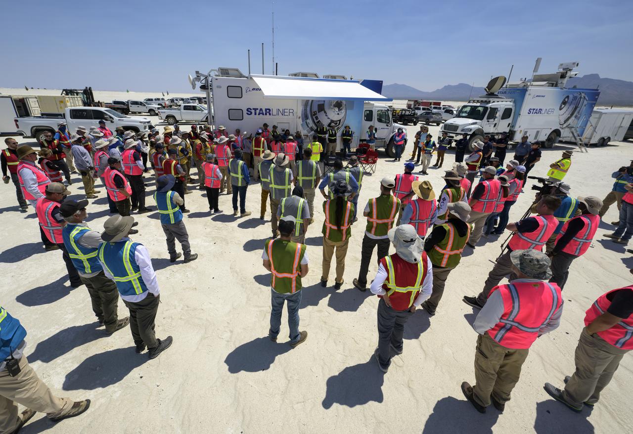 NASA and Boeing teams prepare for the landing of Boeing’s CST-100 Starliner spacecraft at White Sands Missile Range’s Space Harbor, Wednesday, May 25, 2022, in New Mexico. Boeing’s Orbital Flight Test-2 (OFT-2) is Starliner’s second uncrewed flight test to the International Space Station as part of NASA's Commercial Crew Program. OFT-2 serves as an end-to-end test of the system's capabilities. Photo Credit: (NASA/Bill Ingalls)