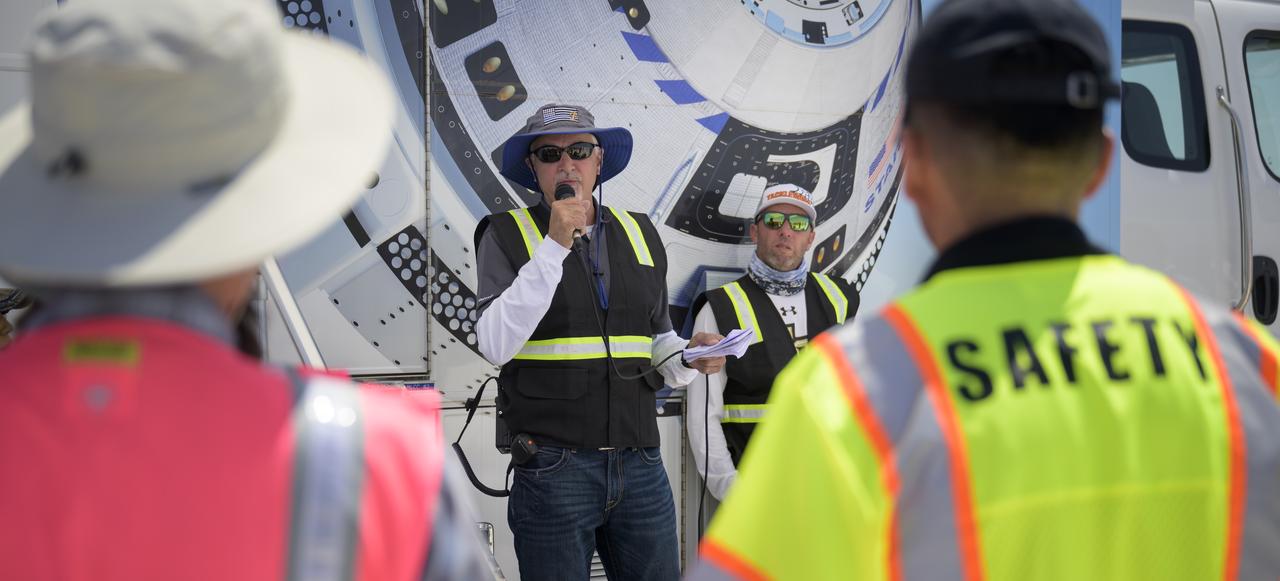 Boeing Recovery Operations Leader Jeffery Davis, left, and Boeing Recovery Director Bryan Gartner, talk to NASA and Boeing teams as they prepare for the landing of Boeing’s CST-100 Starliner spacecraft at White Sands Missile Range’s Space Harbor, Wednesday, May 25, 2022, in New Mexico. Boeing’s Orbital Flight Test-2 (OFT-2) is Starliner’s second uncrewed flight test to the International Space Station as part of NASA's Commercial Crew Program. OFT-2 serves as an end-to-end test of the system's capabilities. Photo Credit: (NASA/Bill Ingalls)