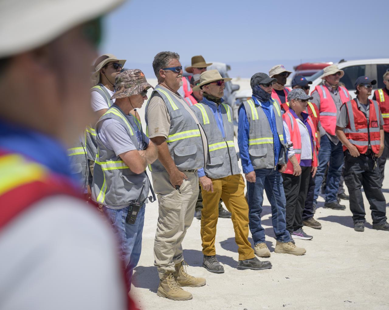 NASA and Boeing teams prepare for the landing of Boeing’s CST-100 Starliner spacecraft at White Sands Missile Range’s Space Harbor, Wednesday, May 25, 2022, in New Mexico. Boeing’s Orbital Flight Test-2 (OFT-2) is Starliner’s second uncrewed flight test to the International Space Station as part of NASA's Commercial Crew Program. OFT-2 serves as an end-to-end test of the system's capabilities. Photo Credit: (NASA/Bill Ingalls)