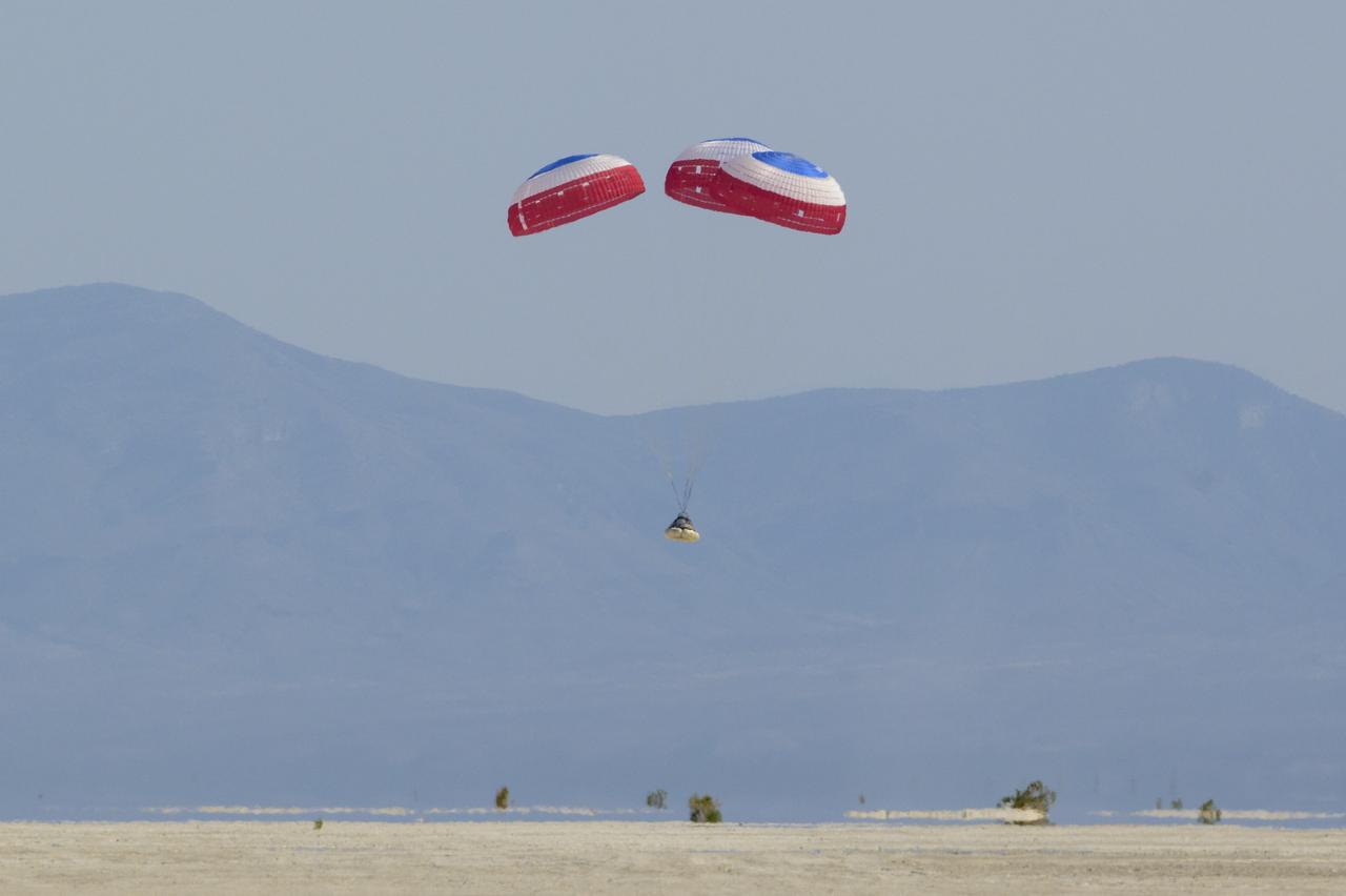 Boeing’s CST-100 Starliner spacecraft lands at White Sands Missile Range’s Space Harbor, Wednesday, May 25, 2022, in New Mexico. Boeing’s Orbital Flight Test-2 (OFT-2) is Starliner’s second uncrewed flight test to the International Space Station as part of NASA's Commercial Crew Program. OFT-2 serves as an end-to-end test of the system's capabilities. Photo Credit: (NASA/Bill Ingalls)