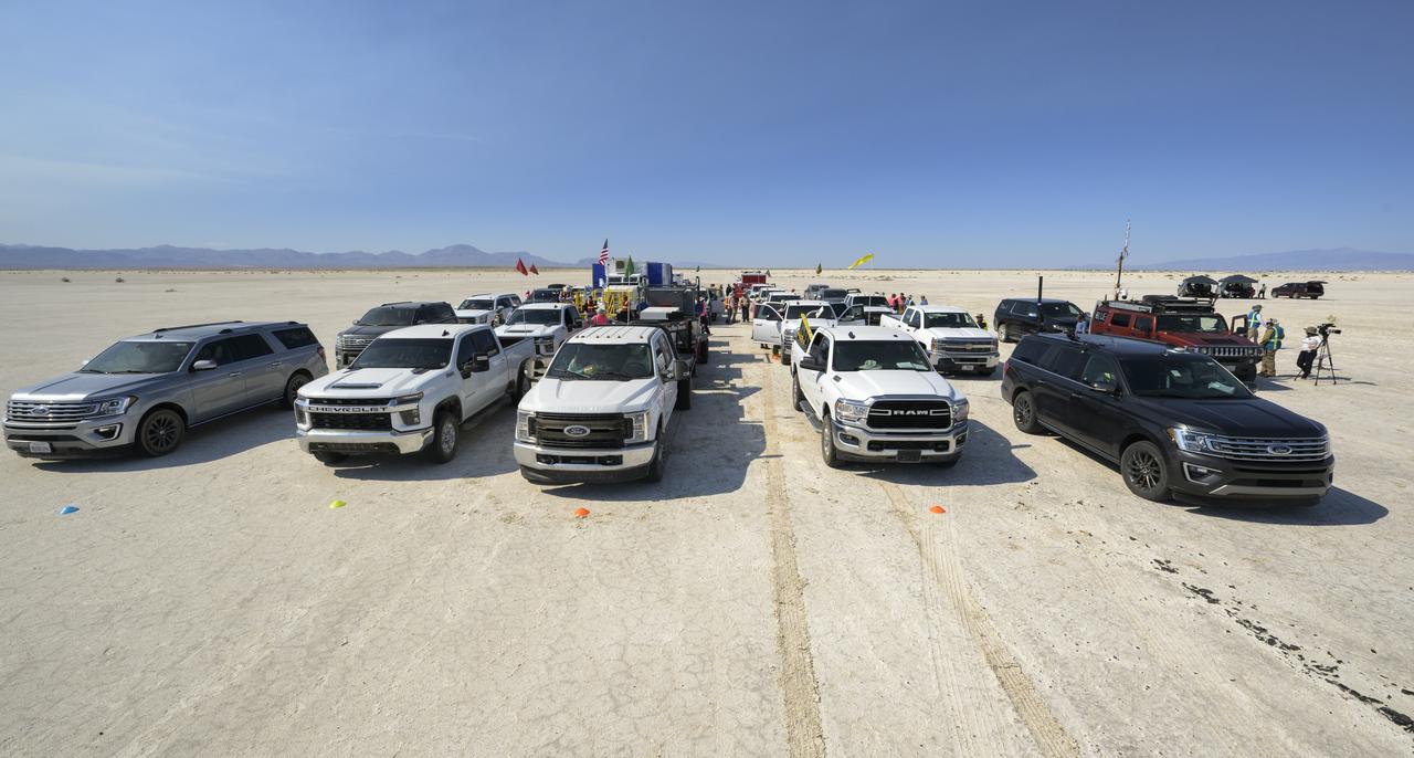 NASA and Boeing teams line up in a convoy as they prepare for the landing of Boeing’s CST-100 Starliner spacecraft at White Sands Missile Range’s Space Harbor, Wednesday, May 25, 2022, in New Mexico. Boeing’s Orbital Flight Test-2 (OFT-2) is Starliner’s second uncrewed flight test to the International Space Station as part of NASA's Commercial Crew Program. OFT-2 serves as an end-to-end test of the system's capabilities. Photo Credit: (NASA/Bill Ingalls)