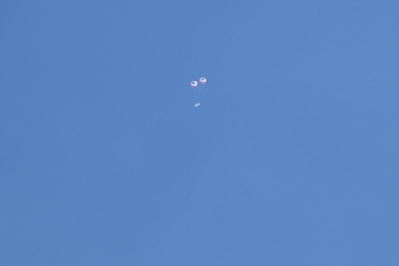 Boeing’s CST-100 Starliner spacecraft lands at White Sands Missile Range’s Space Harbor, Wednesday, May 25, 2022, in New Mexico. Boeing’s Orbital Flight Test-2 (OFT-2) is Starliner’s second uncrewed flight test to the International Space Station as part of NASA's Commercial Crew Program. OFT-2 serves as an end-to-end test of the system's capabilities. Photo Credit: (NASA/Bill Ingalls)