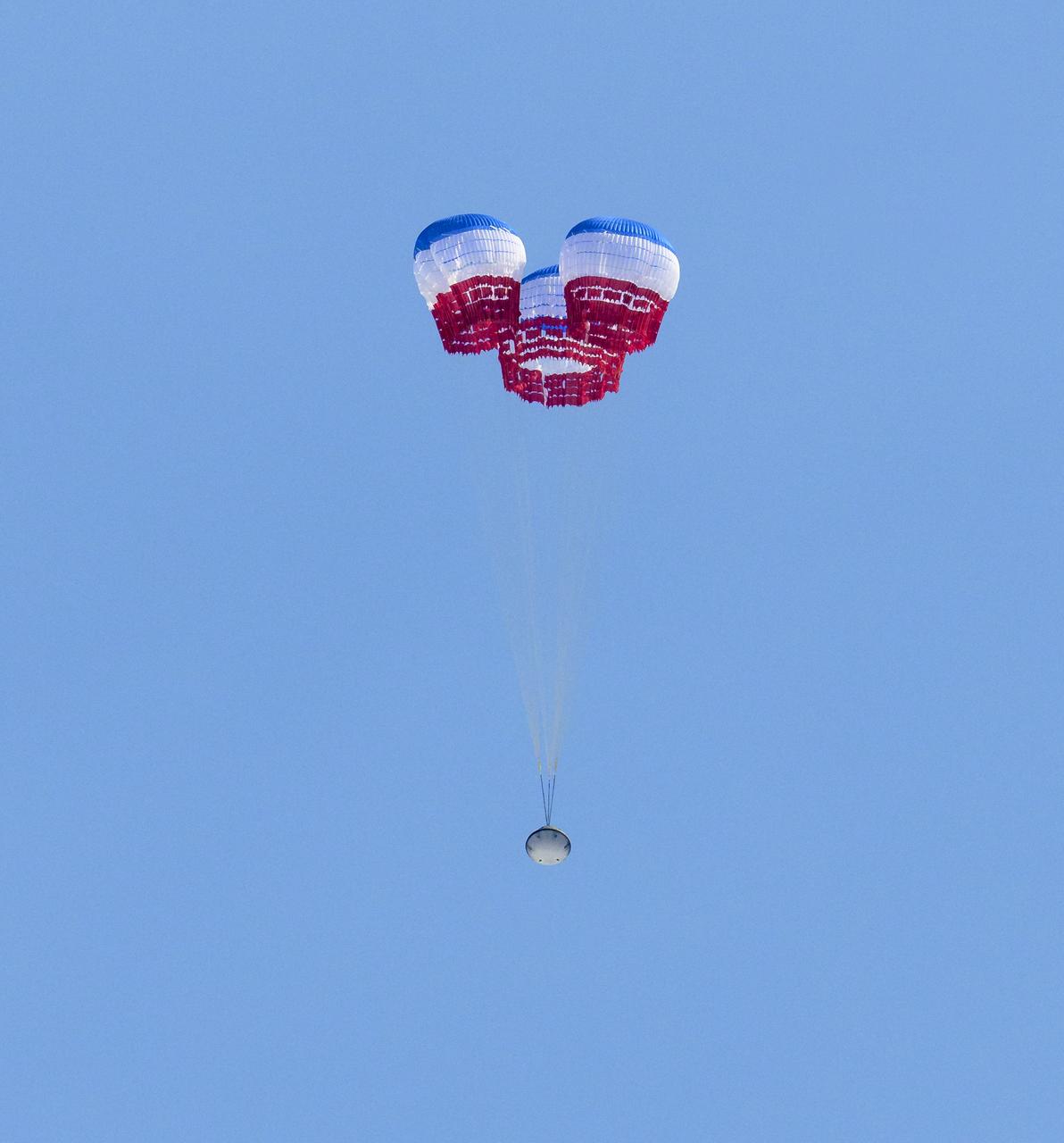 Boeing’s CST-100 Starliner spacecraft lands at White Sands Missile Range’s Space Harbor, Wednesday, May 25, 2022, in New Mexico. Boeing’s Orbital Flight Test-2 (OFT-2) is Starliner’s second uncrewed flight test to the International Space Station as part of NASA's Commercial Crew Program. OFT-2 serves as an end-to-end test of the system's capabilities. Photo Credit: (NASA/Bill Ingalls)