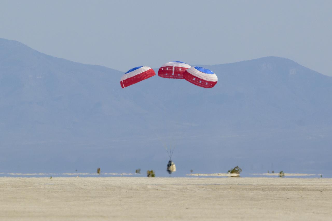 Boeing’s CST-100 Starliner spacecraft lands at White Sands Missile Range’s Space Harbor, Wednesday, May 25, 2022, in New Mexico. Boeing’s Orbital Flight Test-2 (OFT-2) is Starliner’s second uncrewed flight test to the International Space Station as part of NASA's Commercial Crew Program. OFT-2 serves as an end-to-end test of the system's capabilities. Photo Credit: (NASA/Bill Ingalls)