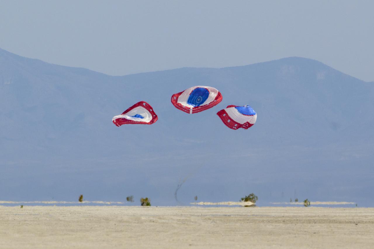 Boeing’s CST-100 Starliner spacecraft lands at White Sands Missile Range’s Space Harbor, Wednesday, May 25, 2022, in New Mexico. Boeing’s Orbital Flight Test-2 (OFT-2) is Starliner’s second uncrewed flight test to the International Space Station as part of NASA's Commercial Crew Program. OFT-2 serves as an end-to-end test of the system's capabilities. Photo Credit: (NASA/Bill Ingalls)
