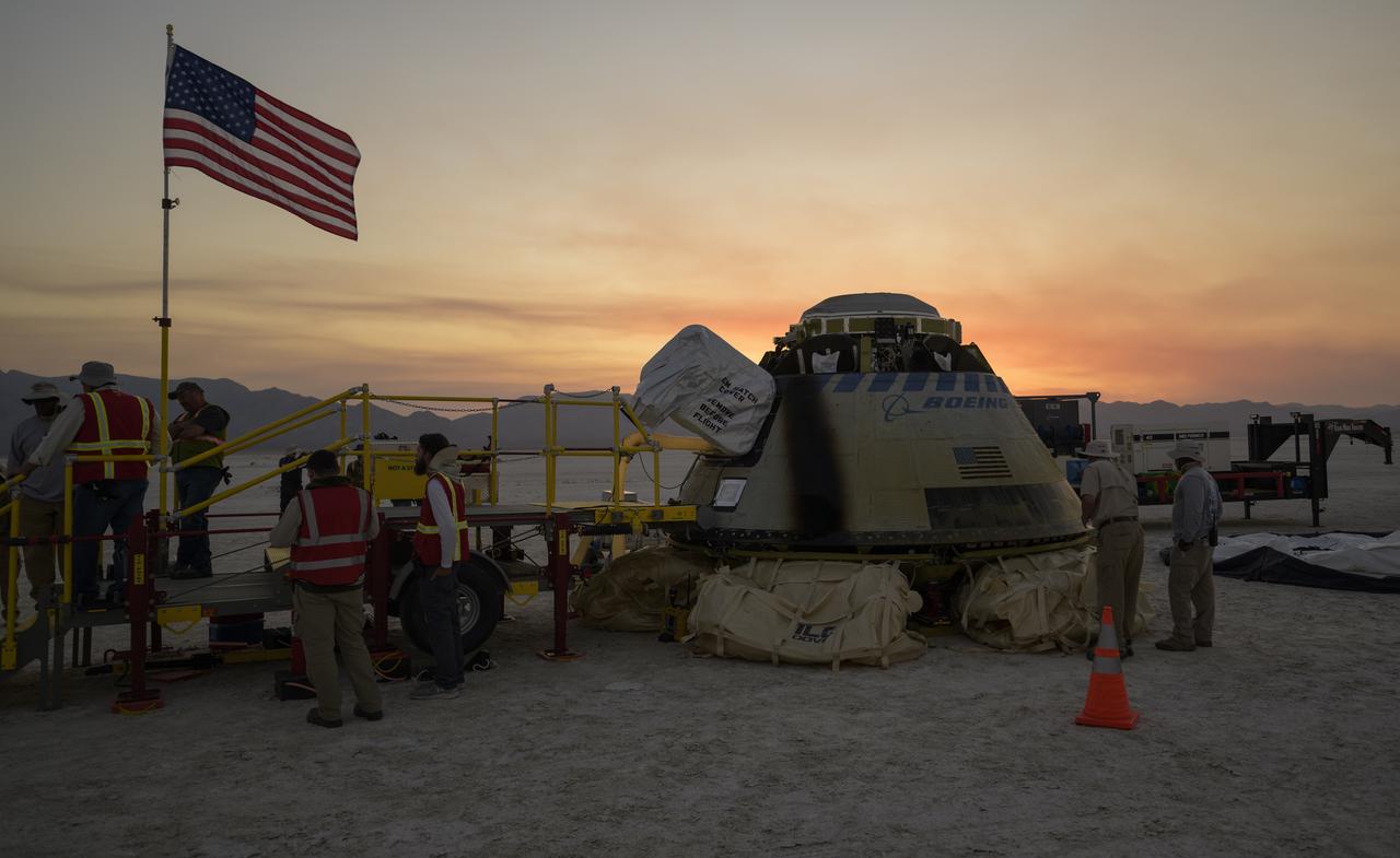 Boeing and NASA teams work around Boeing’s CST-100 Starliner spacecraft after it landed at White Sands Missile Range’s Space Harbor, Wednesday, May 25, 2022, in New Mexico. Boeing’s Orbital Flight Test-2 (OFT-2) is Starliner’s second uncrewed flight test to the International Space Station as part of NASA's Commercial Crew Program. OFT-2 serves as an end-to-end test of the system's capabilities. Photo Credit: (NASA/Bill Ingalls)