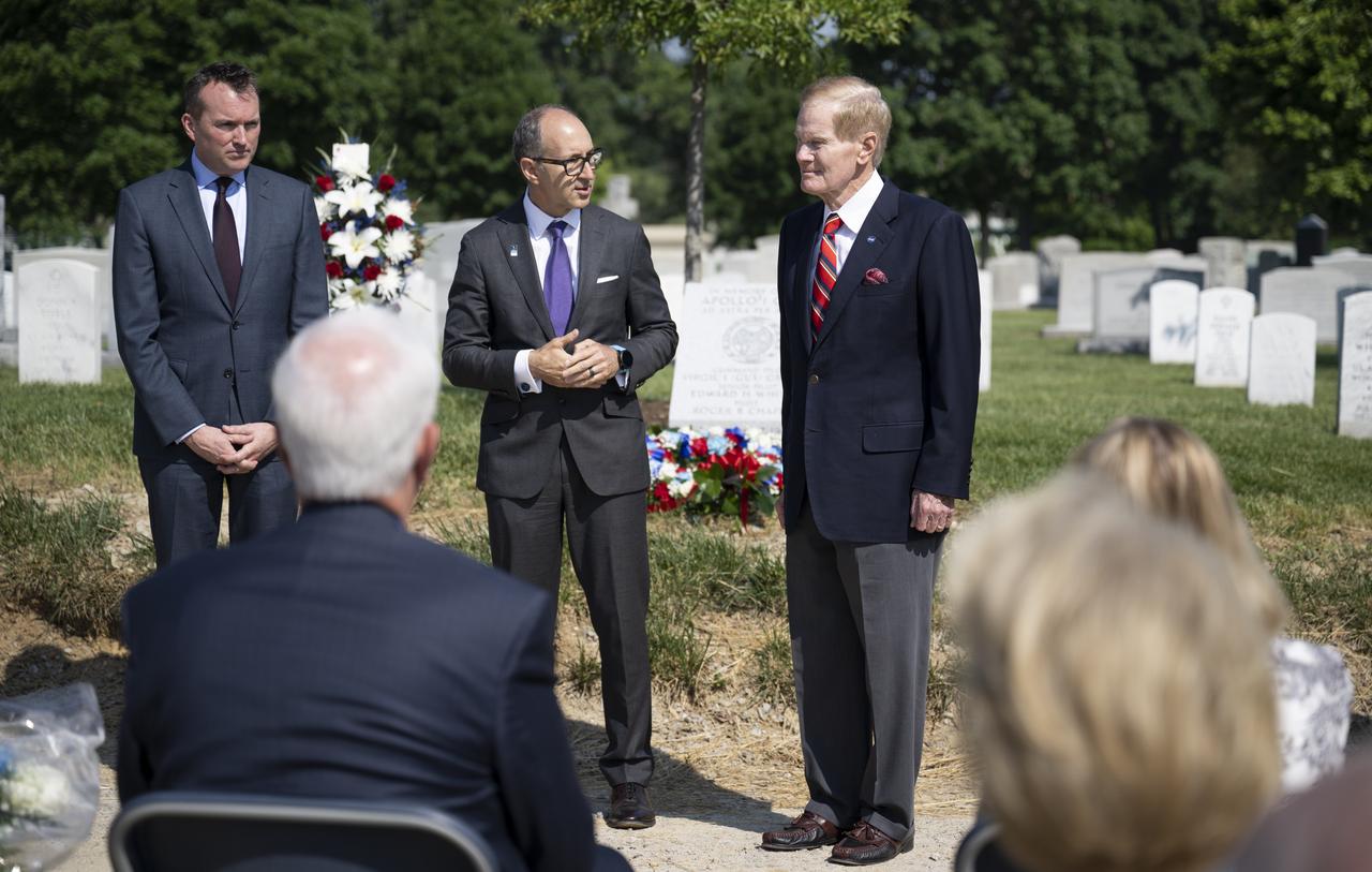 Eric Fanning, AIA President and CEO, left, Lance Bush, President and CEO of the Challenge Center, center, NASA Administrator Bill Nelson, left, are seen as they deliver remarks during the dedication of the Apollo 1 monument at Arlington National Cemetery, Thursday, June 2, 2022, in Arlington, Va. The monument honors and memorializes the Apollo 1 crew of Virgil I. “Gus” Grissom, Edward H. White II, and Roger B. Chaffee. Photo Credit: (NASA/Bill Ingalls)
