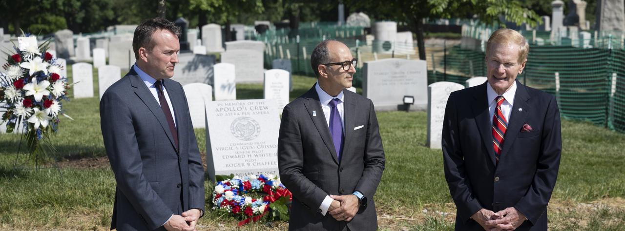Eric Fanning, AIA President and CEO, left, Lance Bush, President and CEO of the Challenge Center, center, NASA Administrator Bill Nelson, right, are seen as they deliver remarks during the dedication of the Apollo 1 monument at Arlington National Cemetery, Thursday, June 2, 2022, in Arlington, Va. The monument honors and memorializes the Apollo 1 crew of Virgil I. “Gus” Grissom, Edward H. White II, and Roger B. Chaffee. Photo Credit: (NASA/Bill Ingalls)