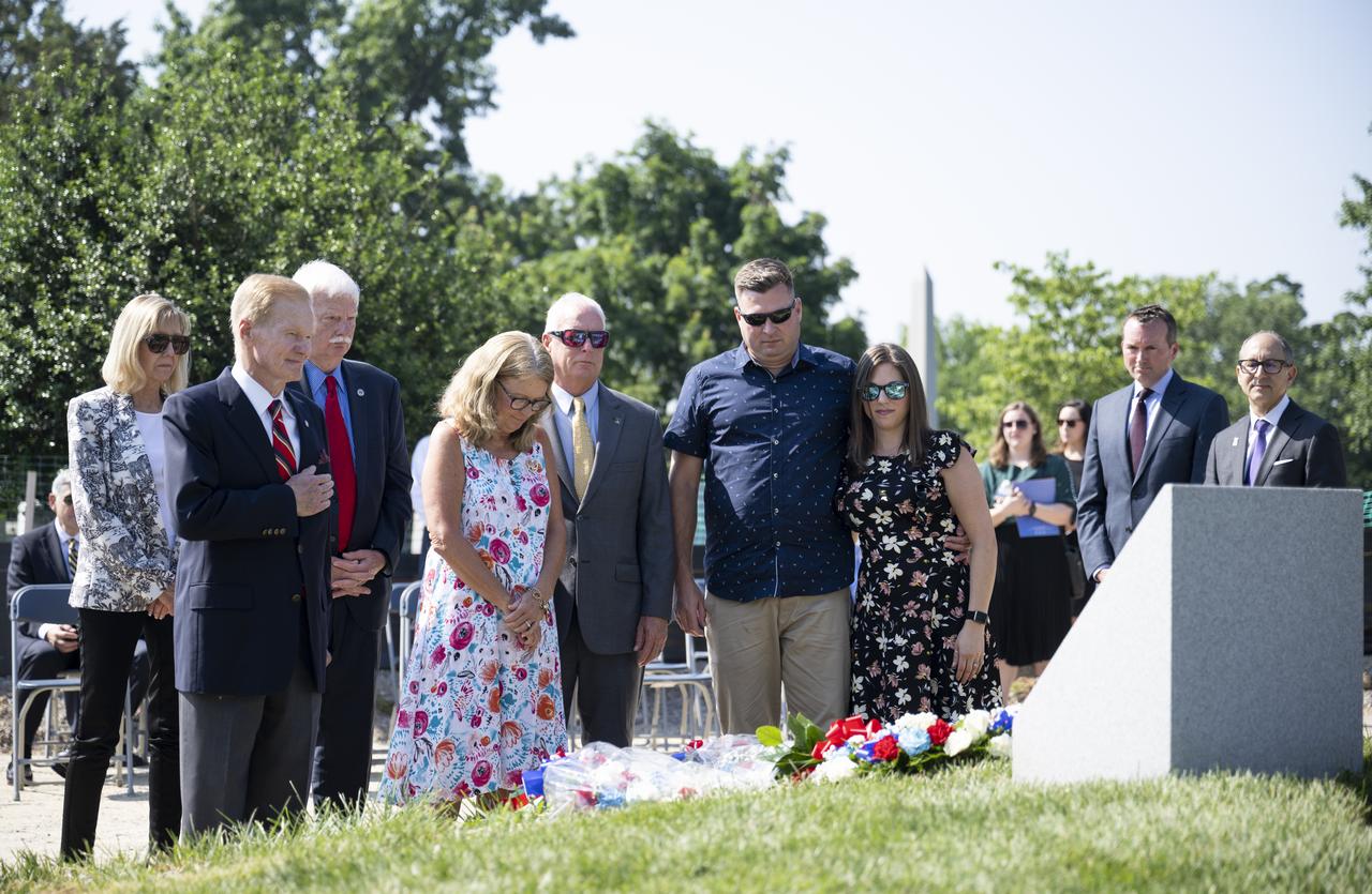 Family members of Apollo 1 astronaut Roger B. Chaffee are joined by NASA Administrator Bill Nelson as they place flowers at the Apollo 1 Monument during its dedication at Arlington National Cemetery, Thursday, June 2, 2022, in Arlington, Va. The monument honors and memorializes the Apollo 1 crew of Virgil I. “Gus” Grissom, Edward H. White II, and Roger B. Chaffee.  Photo Credit: (NASA/Bill Ingalls)