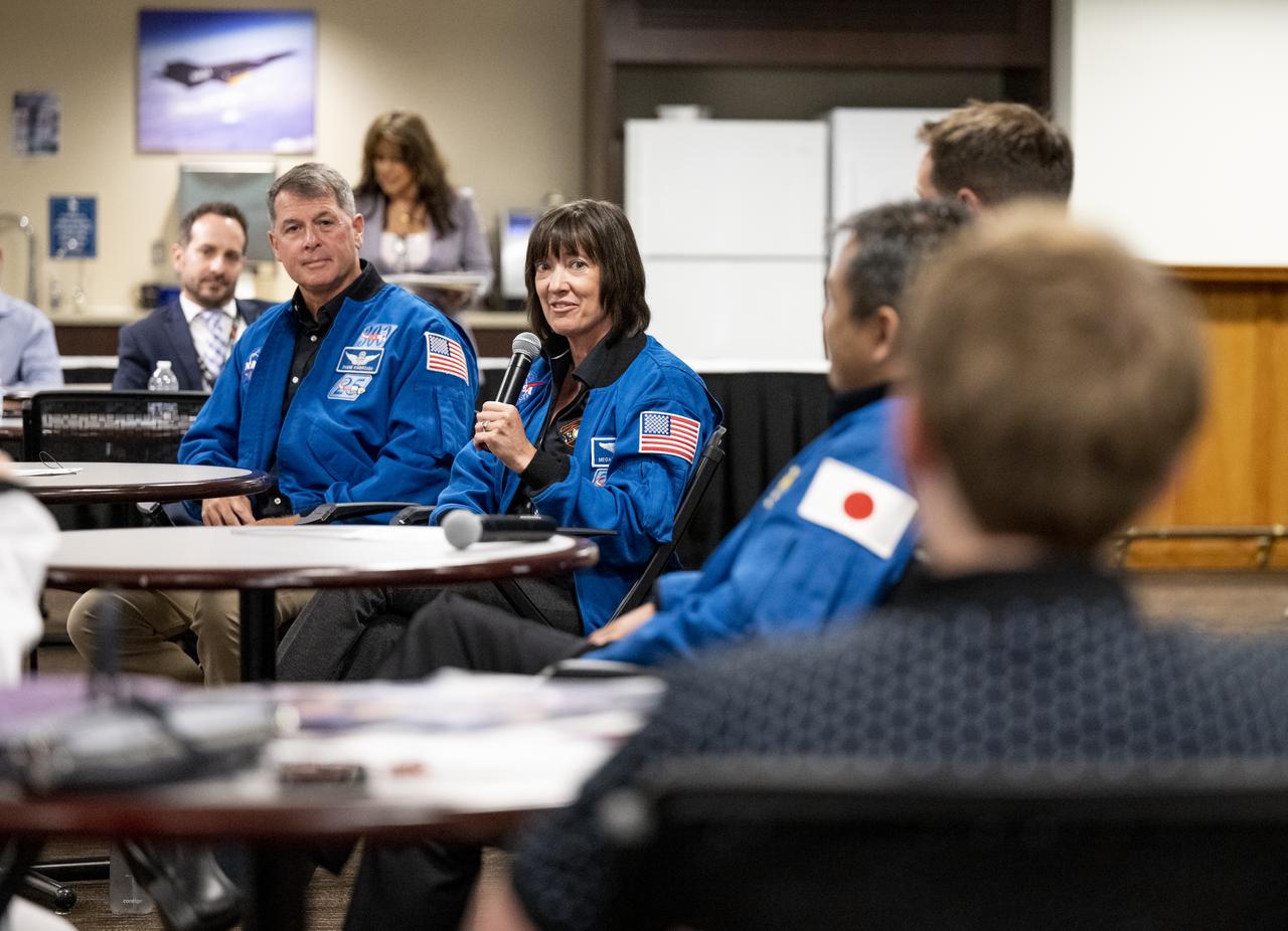 NASA’s SpaceX Crew-2 astronauts Shane Kimbrough, left, and Megan McArthur, right, speak during a meet and greet with employees Tuesday, June 7, 2022, at the Mary W. Jackson NASA Headquarters Building in Washington. Kimbrough, McArthur, Hoshide, and Pesquet completed the second crew rotation mission to the International Space Station as part of the agency’s Commercial Crew Program and spent 198 days aboard the orbiting laboratory as part of Expeditions 65 and 66. Photo Credit: (NASA/Keegan Barber)
