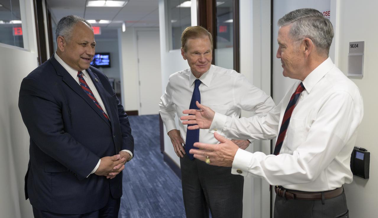 Secretary of the Navy Carlos Del Toro, left, NASA Administrator Bill Nelson, center, and NASA Associate Administrator Bob Cabana talk, Tuesday, June 7, 2022, at the Mary W. Jackson NASA Headquarters in Washington. Photo Credit: (NASA/Bill Ingalls)