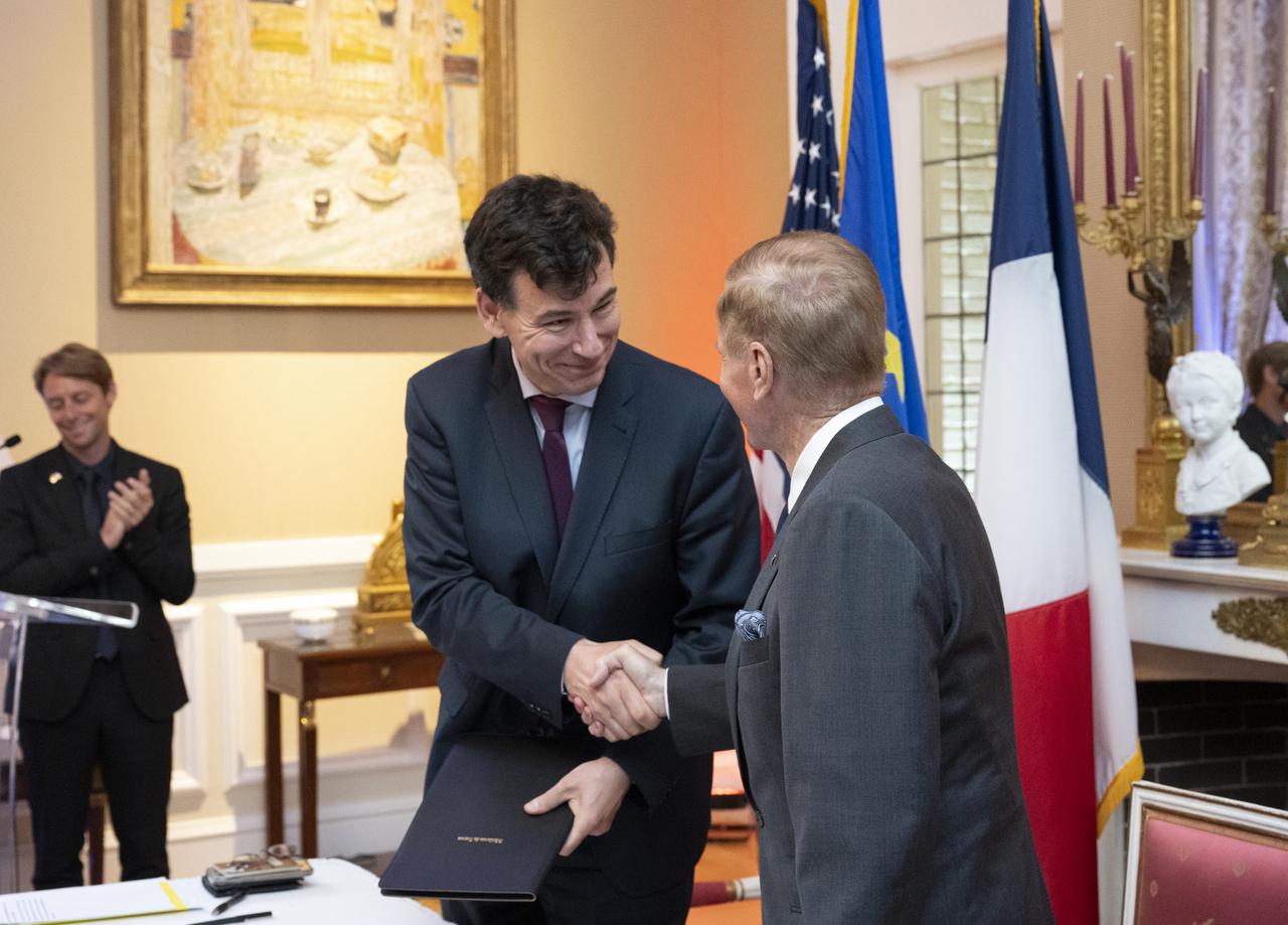 NASA Administrator Bill Nelson and President of the Centre National d’Etudes Spatiales (CNES) Dr. Philippe Baptiste shake hands following the signing the Artemis Accords Tuesday, June 7, 2022, prior to the CNES 60th Anniversary event at the French Ambassador’s Residence in Washington. France is the twentieth country to sign the Artemis Accords, which establish a practical set of principles to guide space exploration cooperation among nations participating in NASA’s Artemis program. Photo Credit: (NASA/Keegan Barber)