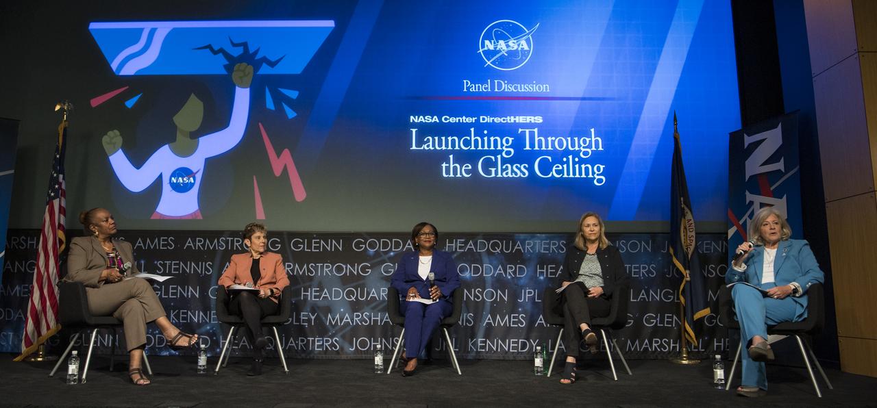 Director of Marshall Space Flight Center, Jody Singer, right, speaks on a panel with NASA's three other female center directors: Dr. Marla Peréz-Davis of Glenn Research Center, second from left, Vanessa Wyche of Johnson Space Center, center, Janet Petro of Kennedy Space Center, second from right, moderated by NASA General Counsel Sumara Thompson-King, left, during the "DirectHERS" - Launching Through the Glass Ceiling event, Tuesday, June 7, 2022, at the Mary W. Jackson NASA Headquarters Building in Washington. Photo Credit: (NASA/Aubrey Gemignani)