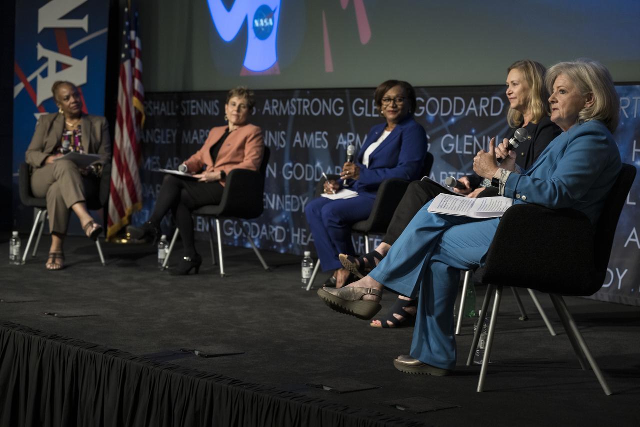 Director of Marshall Space Flight Center, Jody Singer, right, speaks on a panel with NASA's three other female center directors: Dr. Marla Peréz-Davis of Glenn Research Center, second from left, Vanessa Wyche of Johnson Space Center, center, and Janet Petro of Kennedy Space Center, second from right, moderated by NASA General Counsel, Sumara Thompson-King, left, during the "DirectHERS" - Launching Through the Glass Ceiling event, Tuesday, June 7, 2022, at the Mary W. Jackson NASA Headquarters Building in Washington. Photo Credit: (NASA/Aubrey Gemignani)