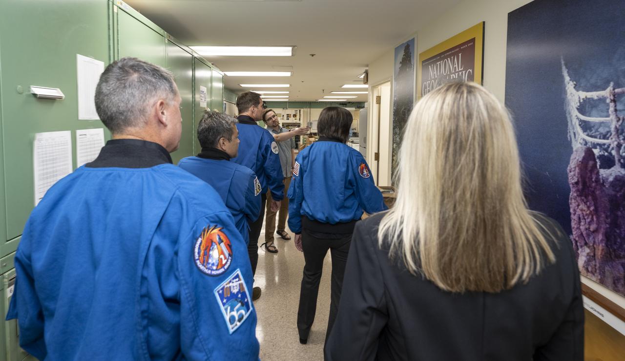 Photo Engineer Tom O’Brien speaks with NASA’s SpaceX Crew-2 astronauts during a tour of the Photo Engineering Department, Tuesday, June 7, 2022, at National Geographic Headquarters in Washington. Kimbrough, McArthur, Hoshide, and Pesquet completed the second crew rotation mission to the International Space Station as part of the agency’s Commercial Crew Program and spent 198 days aboard the orbiting laboratory as part of Expeditions 65 and 66. Photo Credit: (NASA/Keegan Barber)