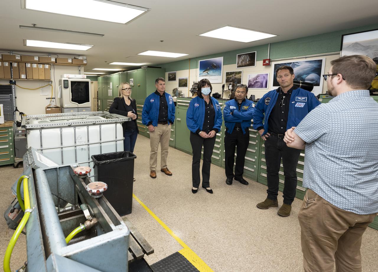 Photo Engineer Tom O’Brien speaks with NASA’s SpaceX Crew-2 astronauts during a tour of the Photo Engineering Department, Tuesday, June 7, 2022, at National Geographic Headquarters in Washington. Kimbrough, McArthur, Hoshide, and Pesquet completed the second crew rotation mission to the International Space Station as part of the agency’s Commercial Crew Program and spent 198 days aboard the orbiting laboratory as part of Expeditions 65 and 66. Photo Credit: (NASA/Keegan Barber)