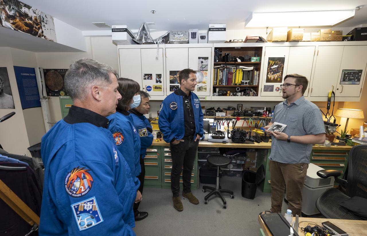 Photo Engineer Tom O’Brien speaks with NASA’s SpaceX Crew-2 astronauts during a tour of the Photo Engineering Department, Tuesday, June 7, 2022, at National Geographic Headquarters in Washington. Kimbrough, McArthur, Hoshide, and Pesquet completed the second crew rotation mission to the International Space Station as part of the agency’s Commercial Crew Program and spent 198 days aboard the orbiting laboratory as part of Expeditions 65 and 66. Photo Credit: (NASA/Keegan Barber)