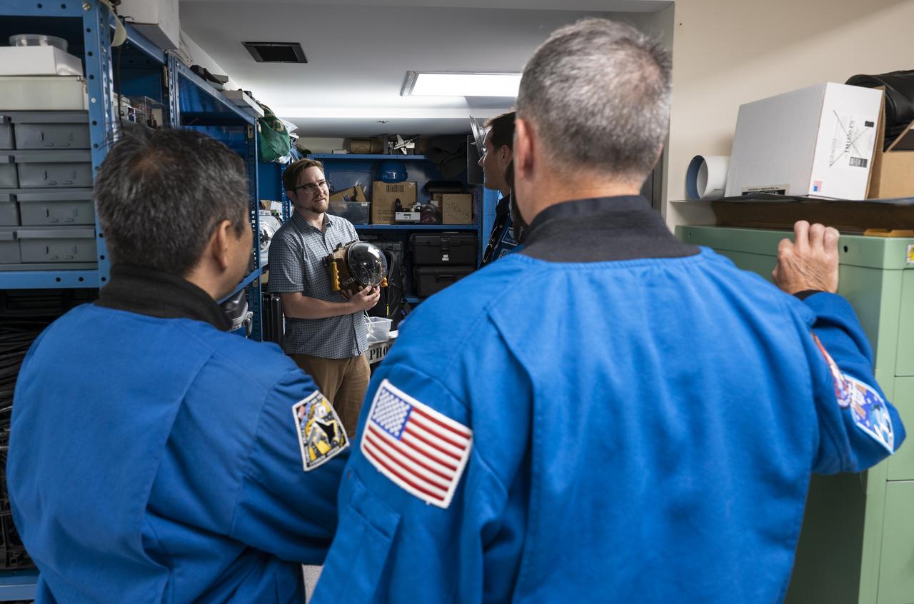 Photo Engineer Tom O’Brien speaks with NASA’s SpaceX Crew-2 astronauts during a tour of the Photo Engineering Department, Tuesday, June 7, 2022, at National Geographic Headquarters in Washington. Kimbrough, McArthur, Hoshide, and Pesquet completed the second crew rotation mission to the International Space Station as part of the agency’s Commercial Crew Program and spent 198 days aboard the orbiting laboratory as part of Expeditions 65 and 66. Photo Credit: (NASA/Keegan Barber)