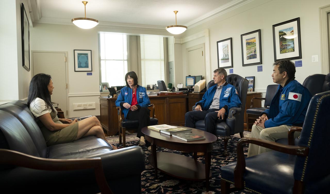 NASA’s SpaceX Crew-2 astronauts Megan McArthur and Shane Kimbrough of NASA, and Japan Aerospace Exploration Agency (JAXA) astronaut Akihiko Hoshide speak with Shannon Estenoz, Assistant Secretary for Fish and Wildlife and Parks, Thursday, June 9, 2022, during a visit to the U.S. Department of the Interior in Washington, DC. Kimbrough, McArthur, Hoshide, and  ESA (European Space Agency) astronaut Thomas Pesquet completed the second crew rotation mission to the International Space Station as part of the agency’s Commercial Crew Program and spent 198 days aboard the orbiting laboratory as part of Expeditions 65 and 66.  Photo Credit: (NASA/Joel Kowsky)