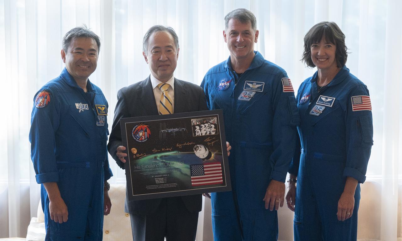 Koji Tomita, Japan's Ambassador to the US, second from left, poses for a picture with NASA’s SpaceX Crew-2 astronauts Akihiko Hoshide of the Japan Aerospace Exploration Agency (JAXA), left, and NASA astronauts Shane Kimbrough, second from right, and Megan McArthur, after being presented with a montage from their mission, Thursday, June 9, 2022, at the Japanese Ambassador’s Residence in Washington, DC. Kimbrough, McArthur, Hoshide, and ESA (European Space Agency) astronaut Thomas Pesquet completed the second crew rotation mission to the International Space Station as part of the agency’s Commercial Crew Program and spent 198 days aboard the orbiting laboratory as part of Expeditions 65 and 66. Photo Credit: (NASA/Joel Kowsky)